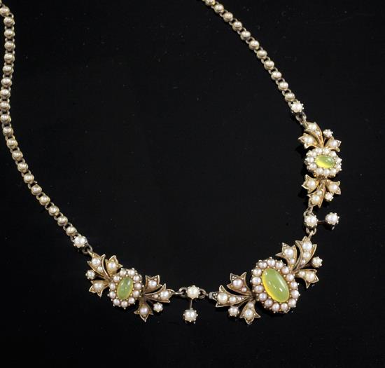 A cased Victorian gold, split pearl and cabochon yellow/green chalcedony? set necklace, 36cm.
